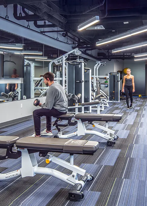 24 Hour Fitness Center with multibenches, cardio, free weights, and strength training