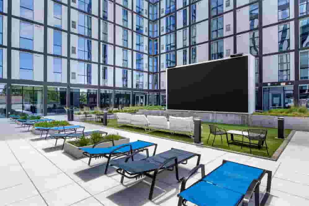 Outdoor Jumbotron in the Coutryard with lounge seating
