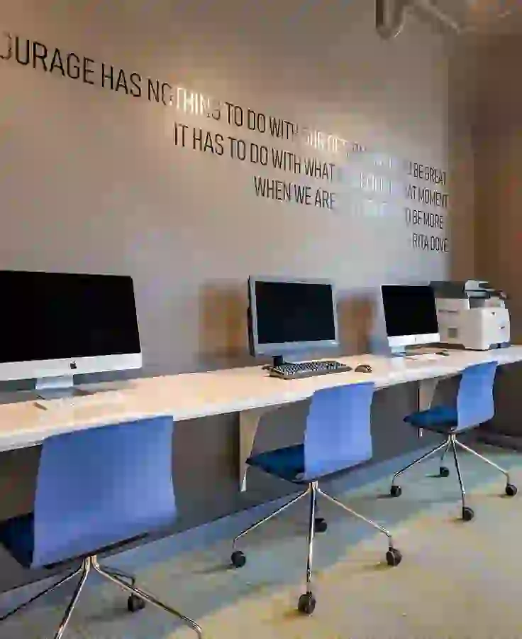 Macs and PCs with print station
