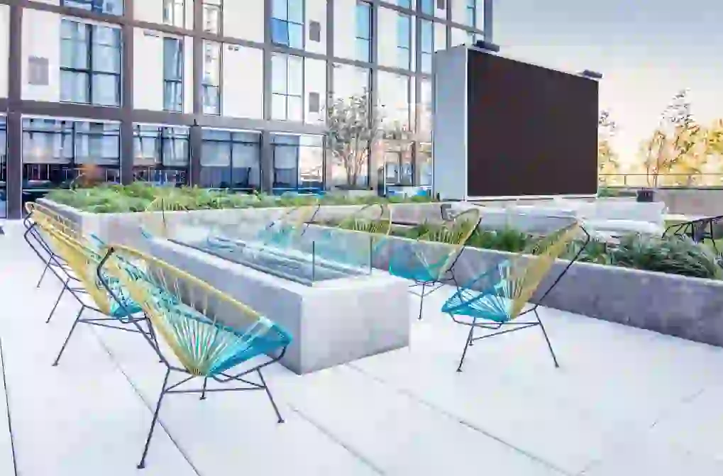 Fire pit in the courtyard with Jumbotron in the background