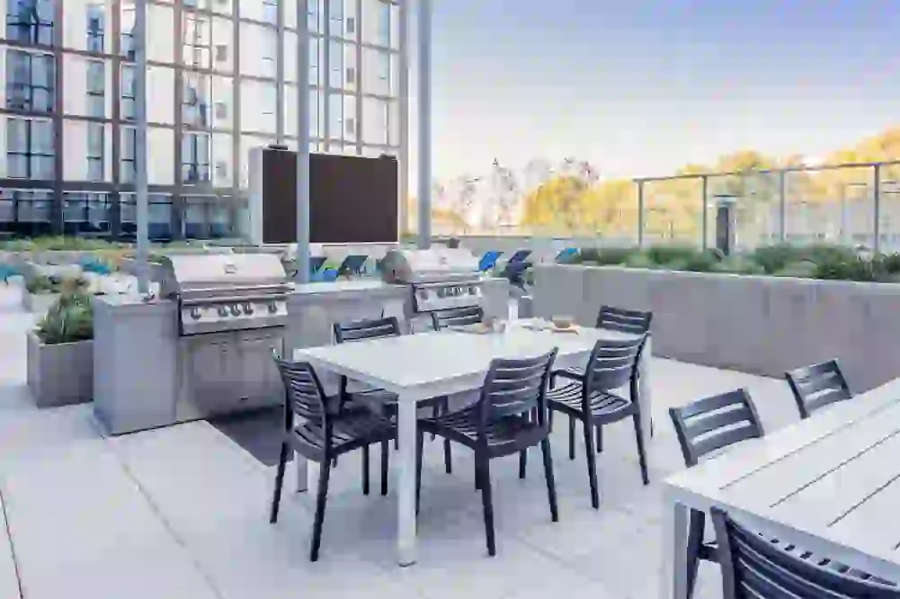 Commercial grills in the courtyard with Jumbotron in the background