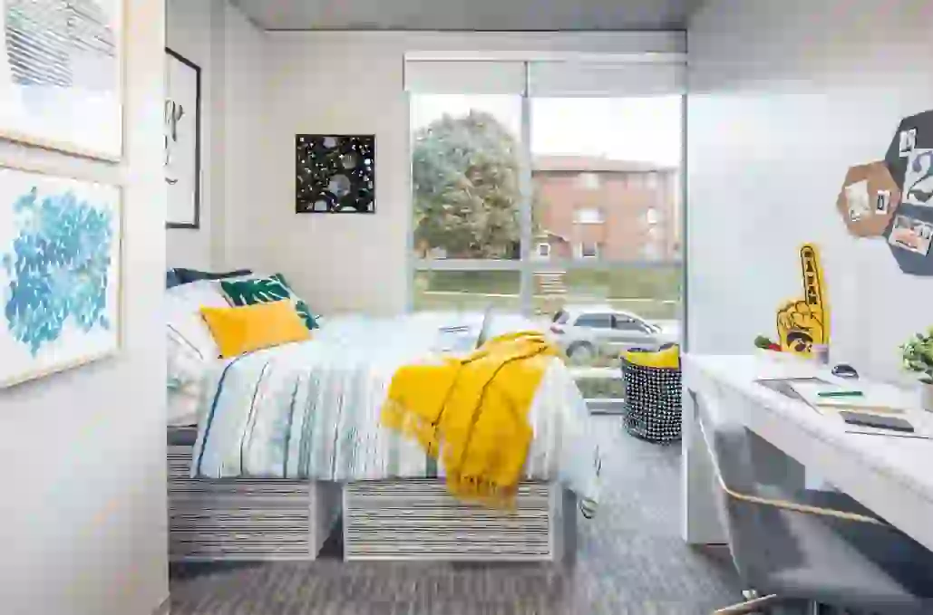 Student bathroom with glass shower doors