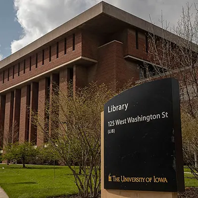 The University of Iowa Main Library sign and exterior